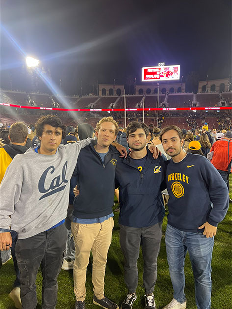 Eduardo Fatio and friends take group photo at a Berkeley Cal football game