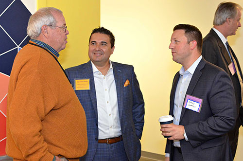 From left: Advisory board member Gordon Dunne, speaker Christopher Mercado and an event attendee