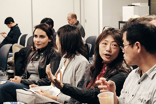 Audience members awaiting for the Fireside Chat to start at the recent AR event.