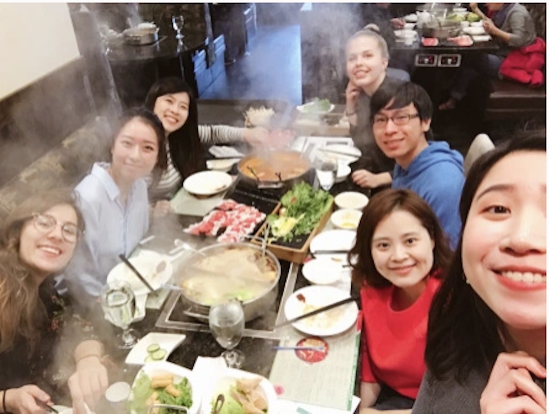 Karin and some of her friends taking a selfie at a restaurant in honor of Chinese New Year. 