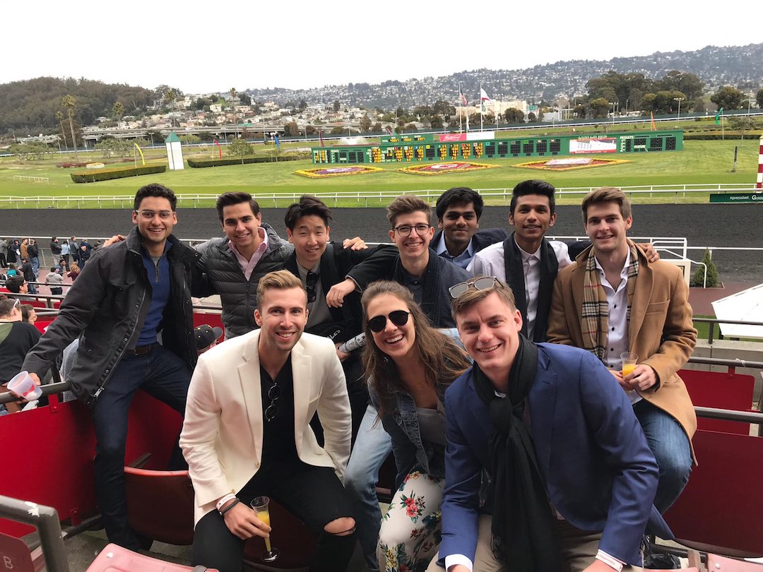 Markus posing with a group of friends and fellow BHGAP students at the Golden Gate Field Dollar Days