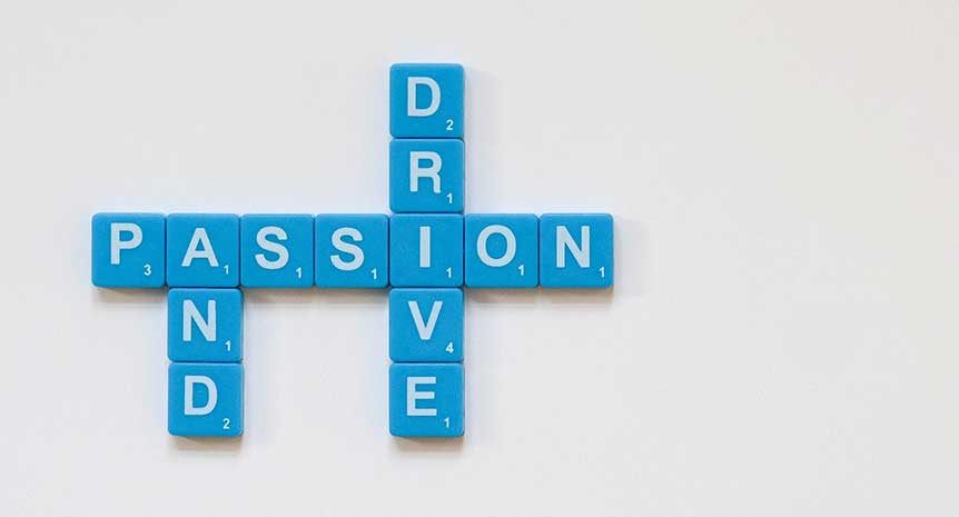 tiles spelling out passion and drive