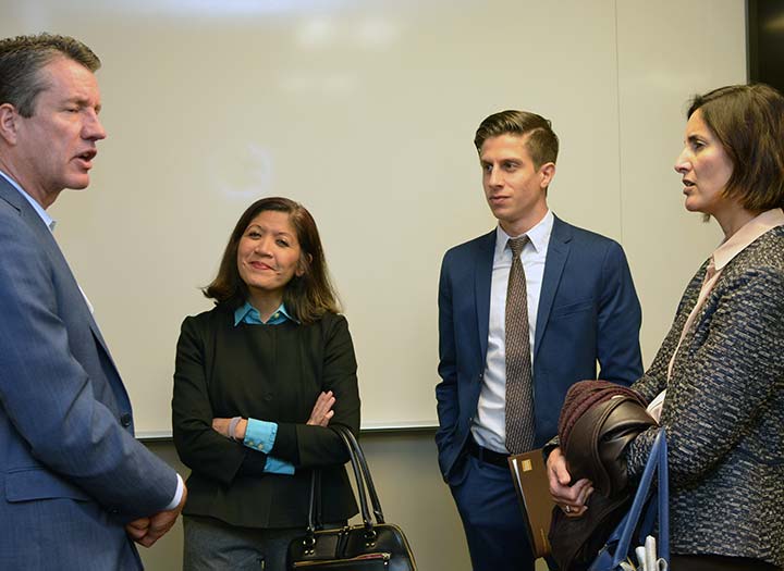 Prospective students and advisory board members mingle