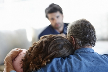 image of couple with grief counselor