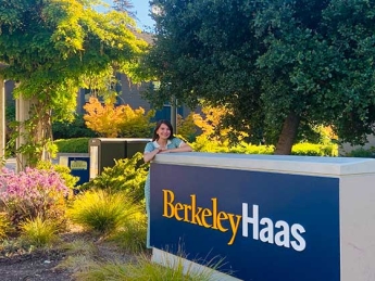 Marie Aure in front of the UC Berkeley Haas School of Business sign