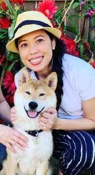 Vivian Dao posing with her dog