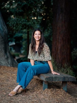 Perline Hochart posing on a bench on the UC Berkeley campus