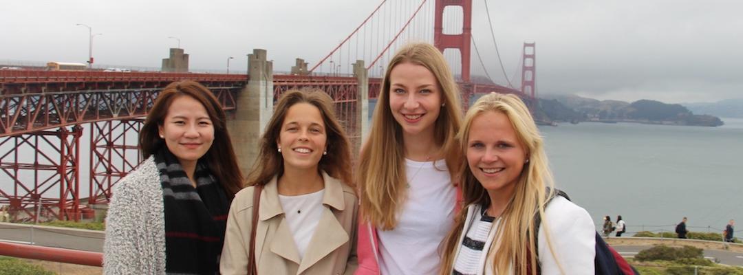 BHGAP student Anna Julia from Germany poses in front of the Golden Gate bridge on a foggy day with classmates.