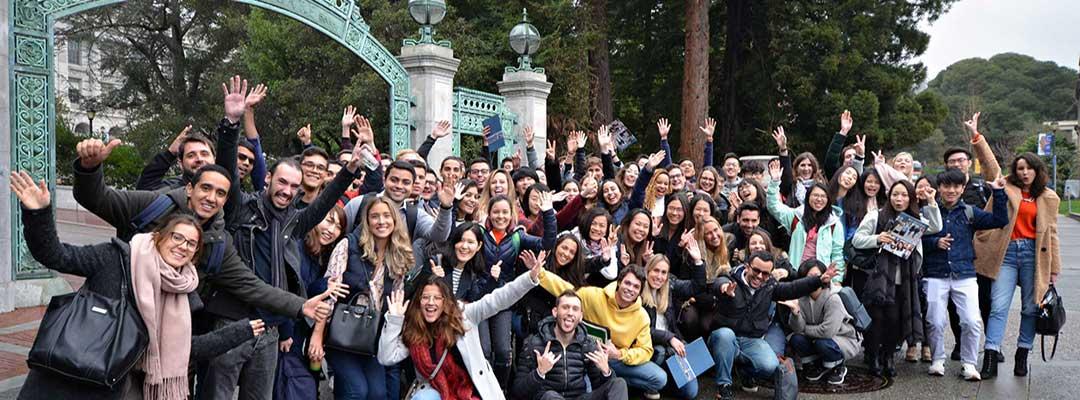 Photo of group of international students in front of UC Berkeley Sather Gate