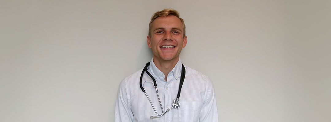 Post-Baccalaureate Health Professions Program alum Jason Veldman with stethoscope