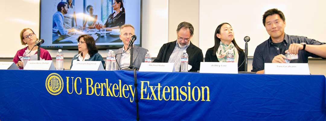 Photo of the Project Management career night panelists sitting behind a table with a UC Berkeley Extension table drape