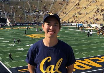 BGA Discover student Dan Pham from Copenhagen poses with this UC Berkeley gear at a football game.