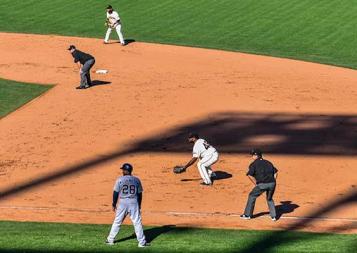 Photo of baseball players on a baseball field