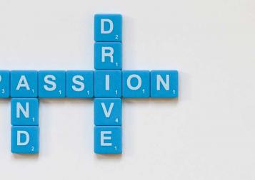 Photo of tiles spelling out Passion and Drive