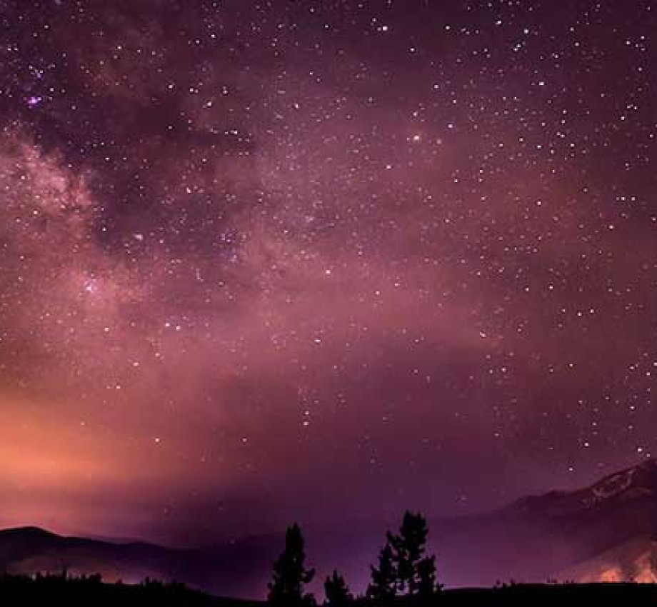 Image of pinkish sky with many stars visible