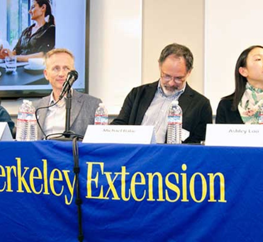 Photo of the Project Management career night panelists sitting behind a table with a UC Berkeley Extension table drape