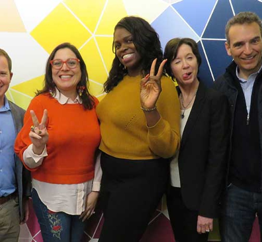 Panelists of the social entrepreneurship event are candid in front of the camera