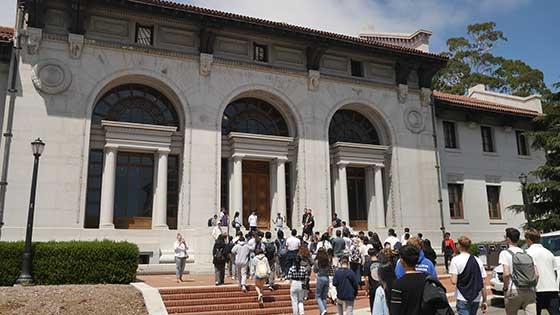 Students walking into Hearst building on UC Berkeley campus