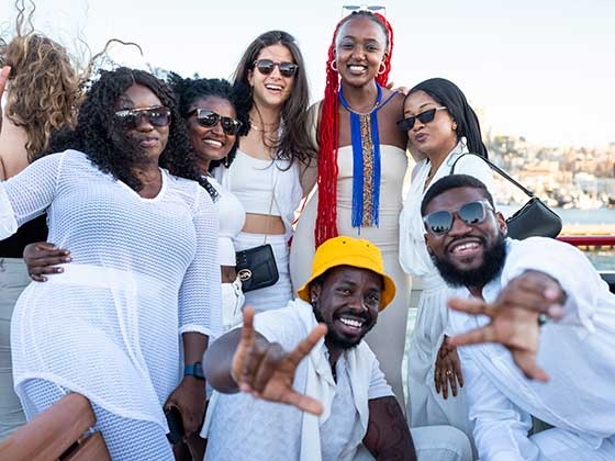 Perline Hochart and group of friends at a white clothes party