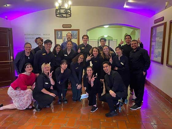 Perline Hochart and group of friends take photo inside UC Berkeley International House