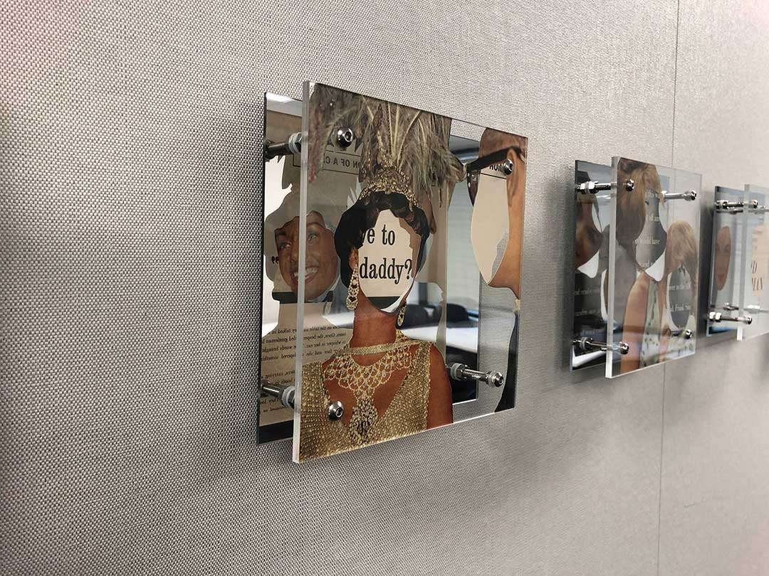 Shannon Milar photo of recent art work that has floating magazine cutouts between clear acrylic sheets and fastened to mirrors