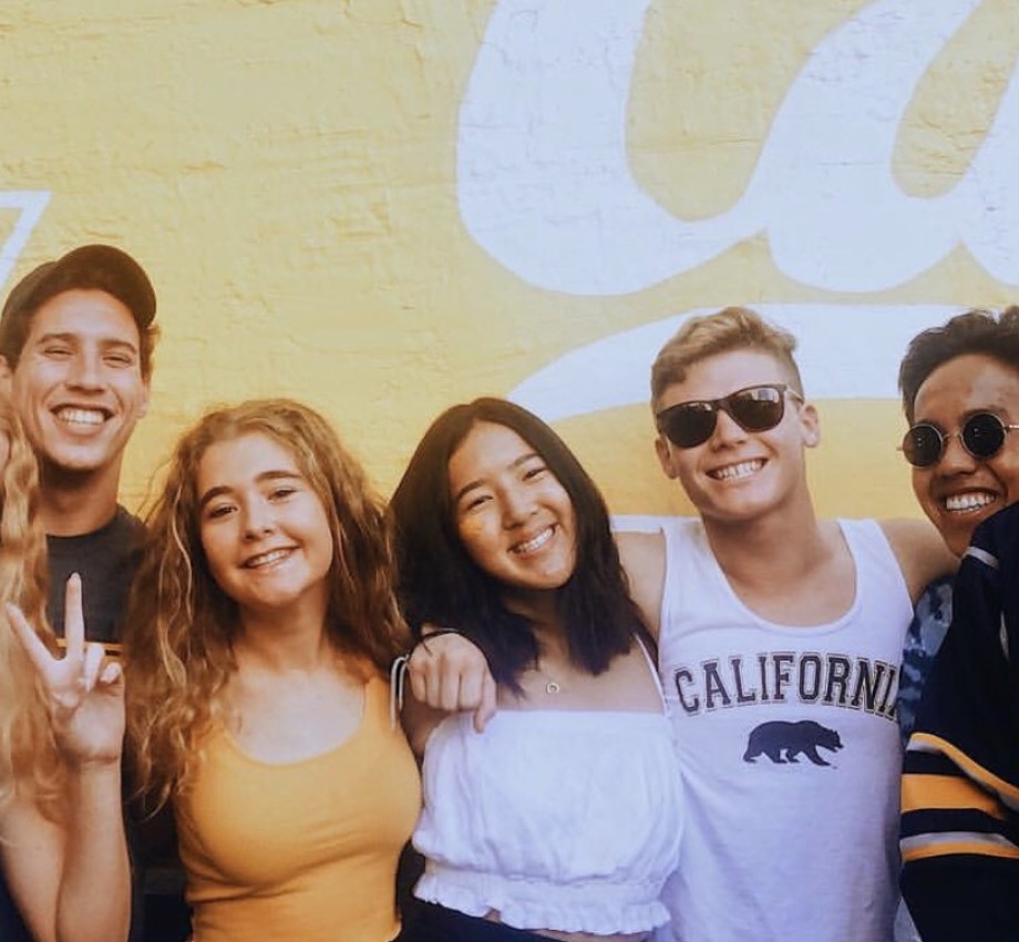 Berkeley undergraduates happily pose in their Cal gear.