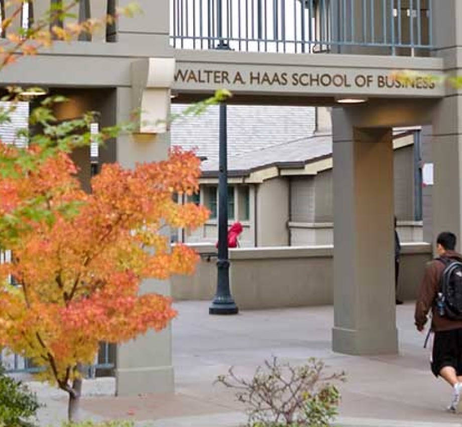 Photo of students walking under Haas School of Business archway