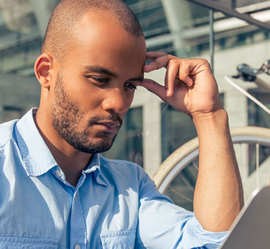 Stock photo of career changer looking at job listings