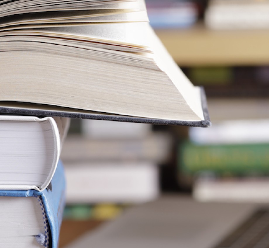 books stacked on top of each other