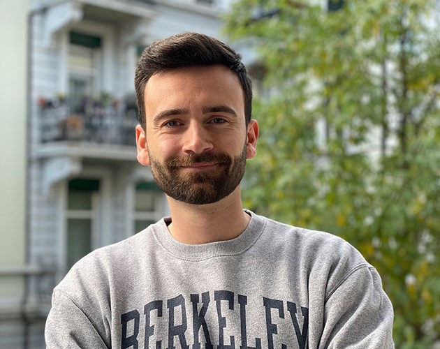 Photo of Lucas Mortier wearing a Berkeley sweatshirt