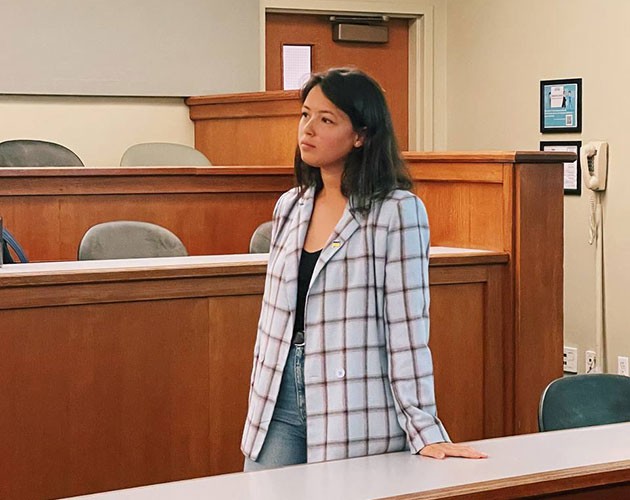 Aliona Margulis posing in a Berkeley Haas classroom