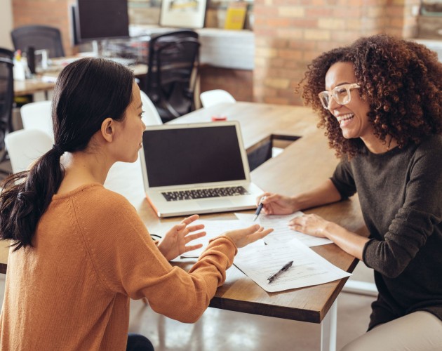 Young businessperson meeting with her mentor