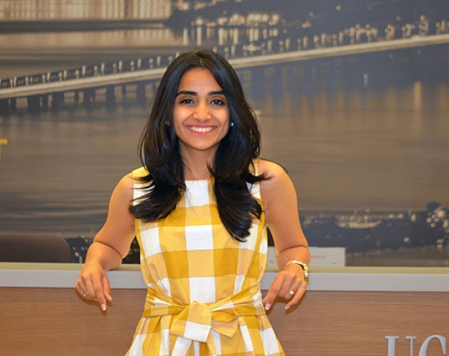 Ankita Mantri confidently leaning on table