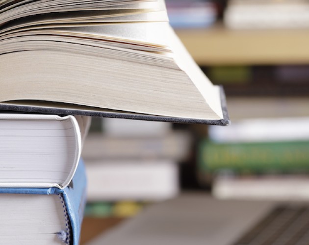 books stacked on top of each other