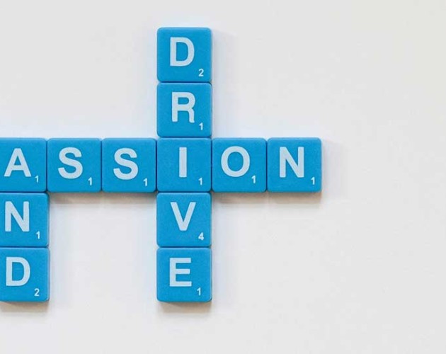 Photo of tiles spelling out Passion and Drive