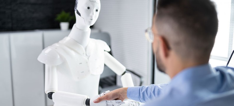 Man At Interview With AI Robot Machine