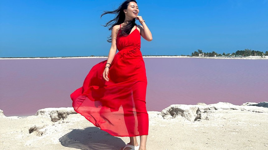 Jeongseo Kim wearing a red dress in Cancun