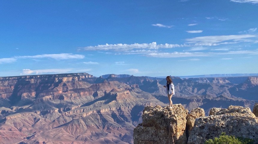 Jeongseo Kim at the edge of a rock at the Grand Canyon