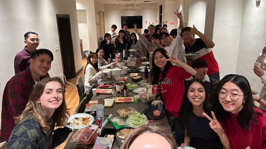 Jeongseo Kim and friends eating dinner to celebrate Lunar New Year