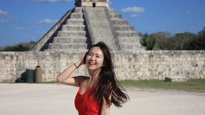 Jeongseo Kim standing in front of a ruin in Mexico