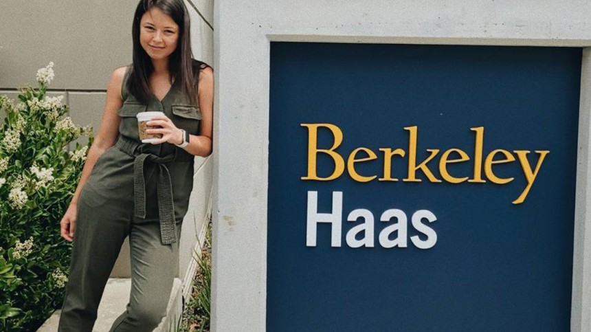 Aliona Margulis poses next to a Berkeley Haas sign