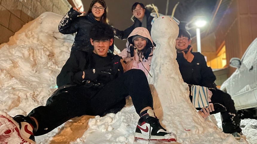 Sibble Zhang and friends building a snowman at Lake Tahoe