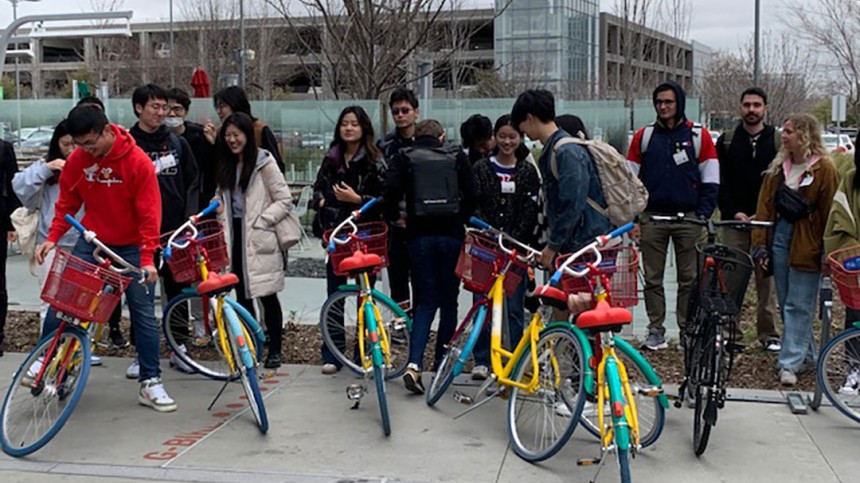 International students hang out at Google bikes